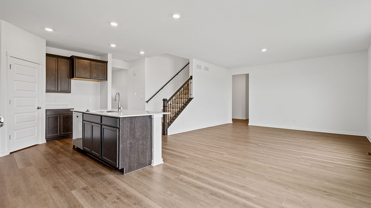 Dining area with aview of the kitchen and living area.