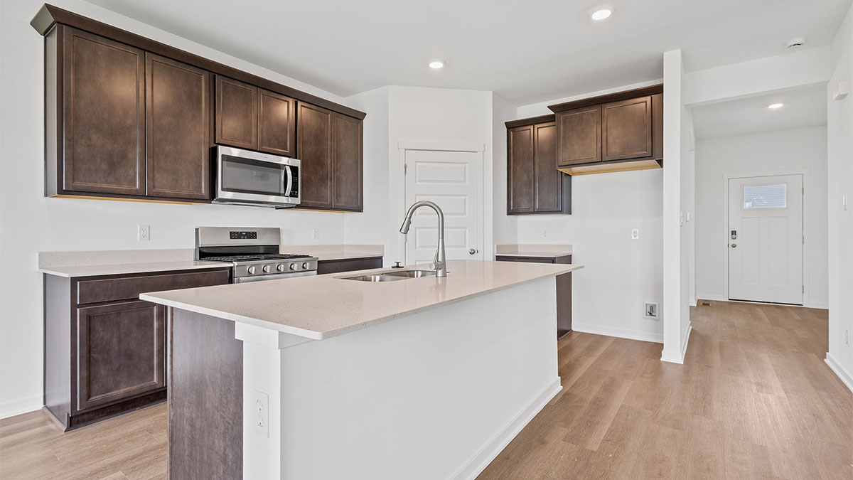 Kitchen with brown cabinets.