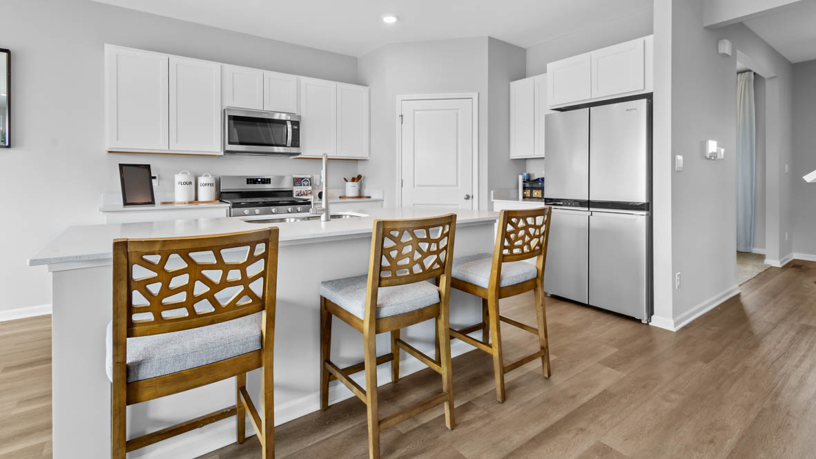 Kitchen island with overhang fitting for barstools