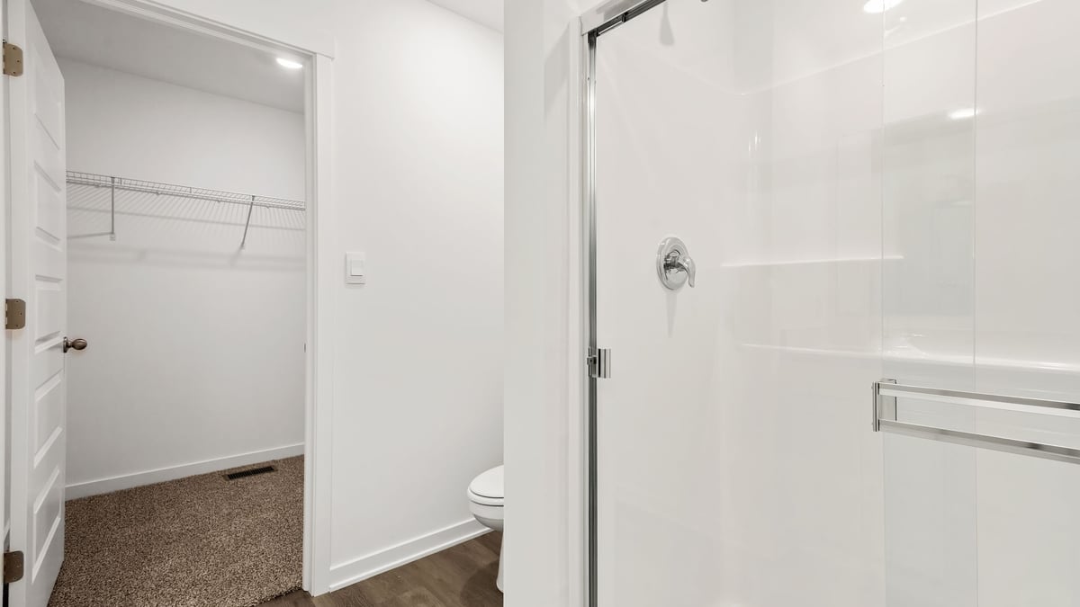 Walk-in shower and a walk-in closet.