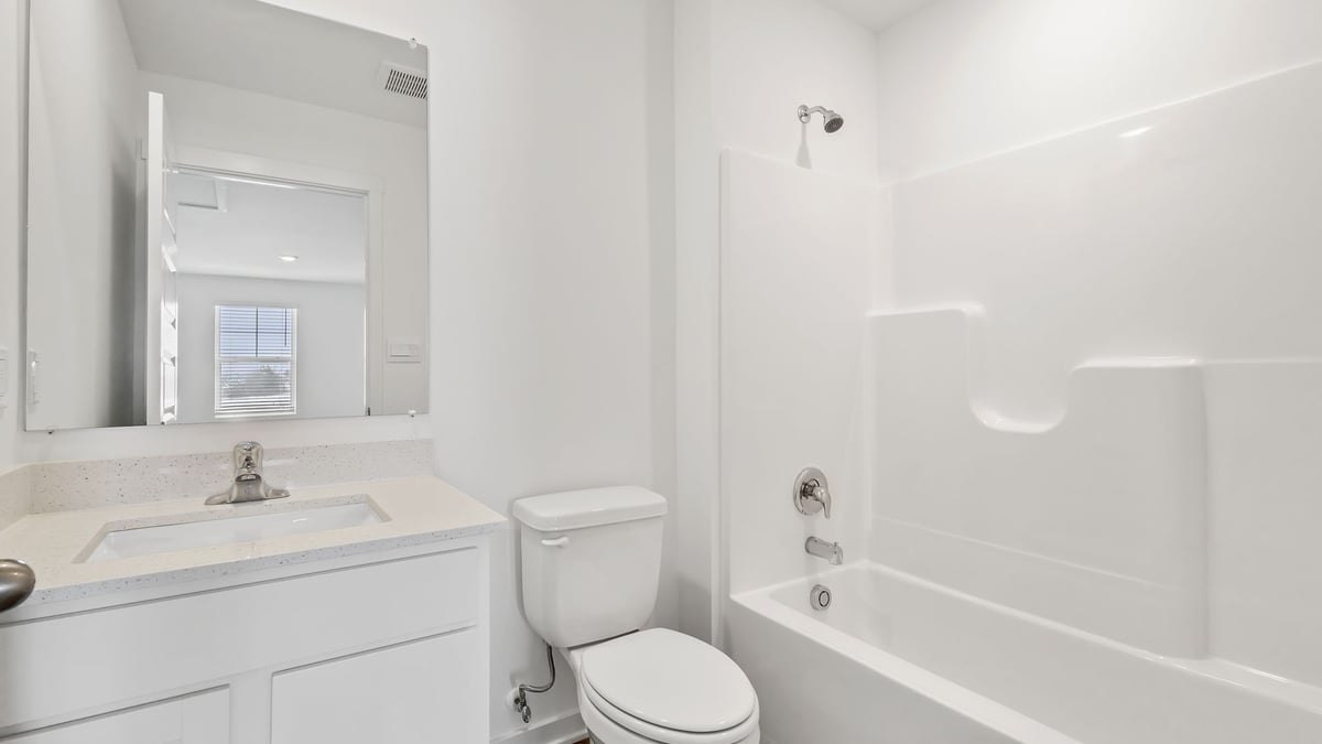 Bathroom with one vanity sink and a shower.