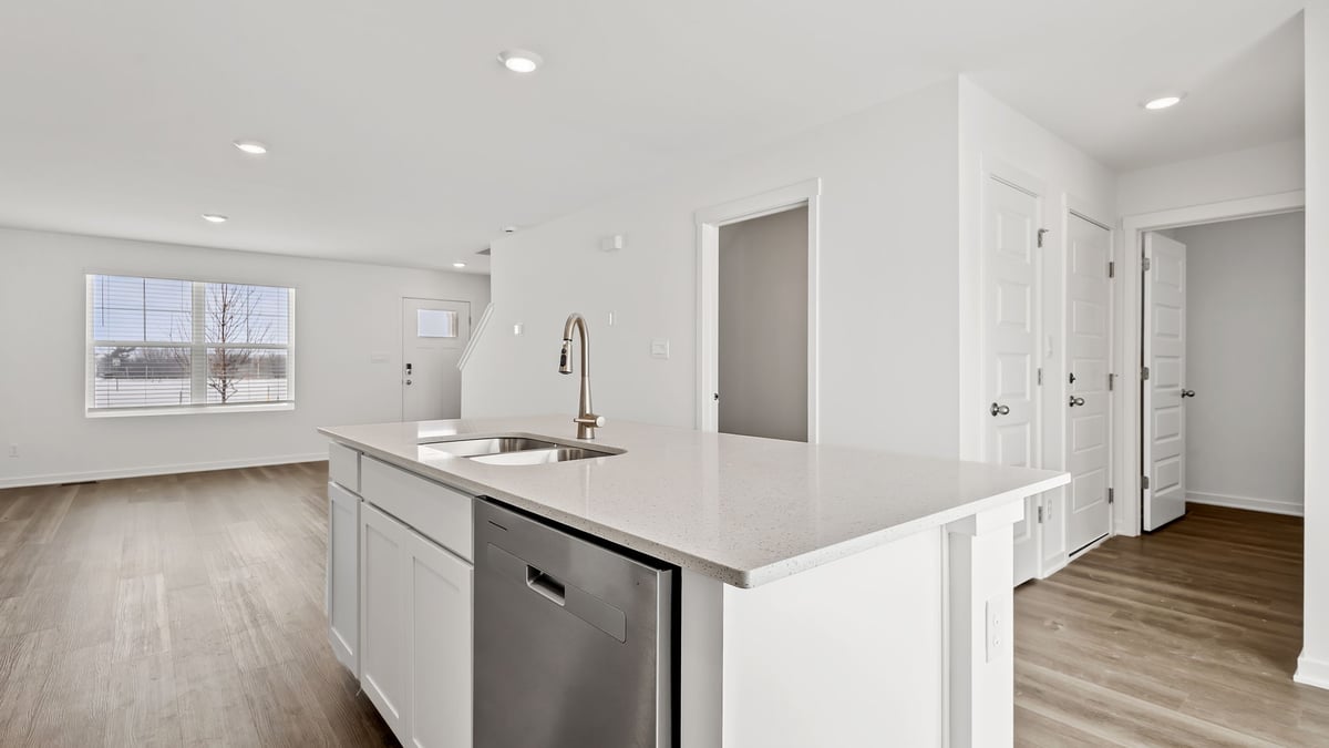 Kitchen island with view of open layout.