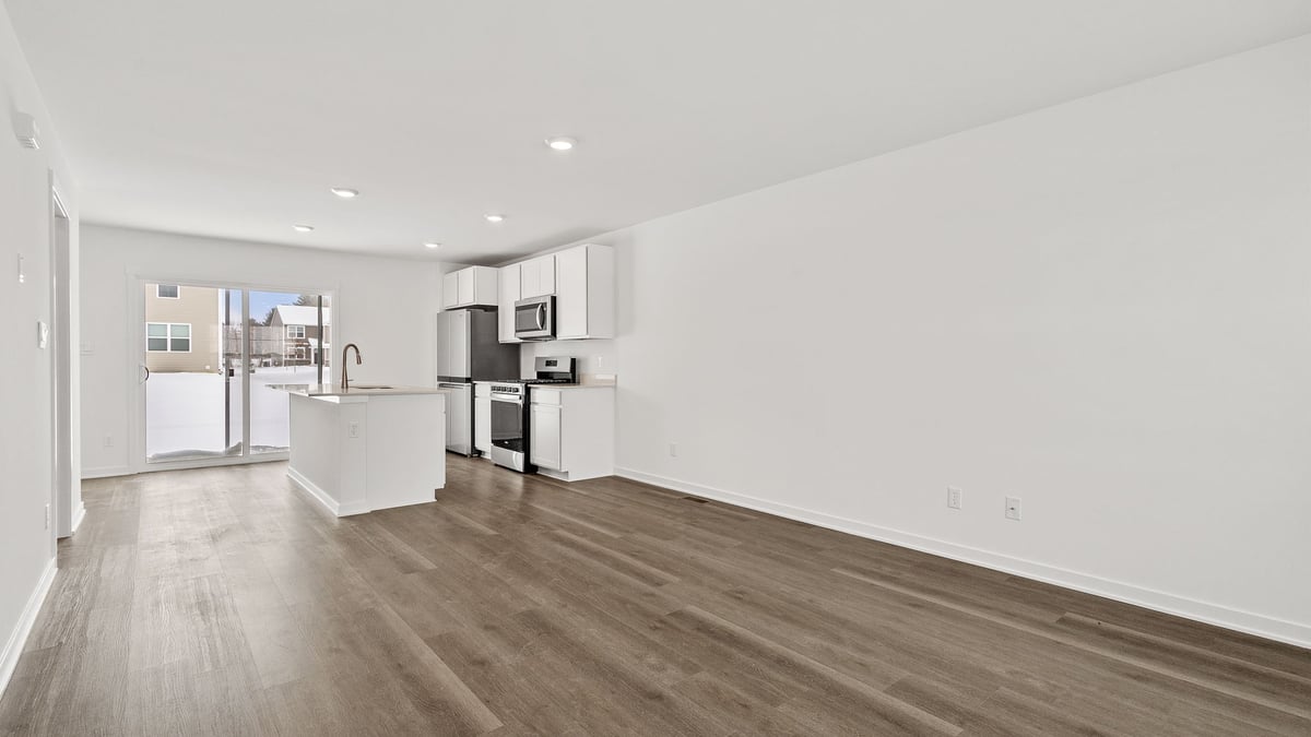 Open living area with hard wood floors.