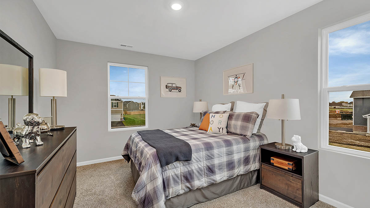 secondary bedroom staged as a bedroom