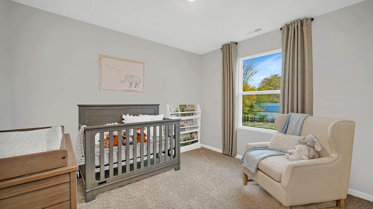 secondary bedroom staged as a nursery