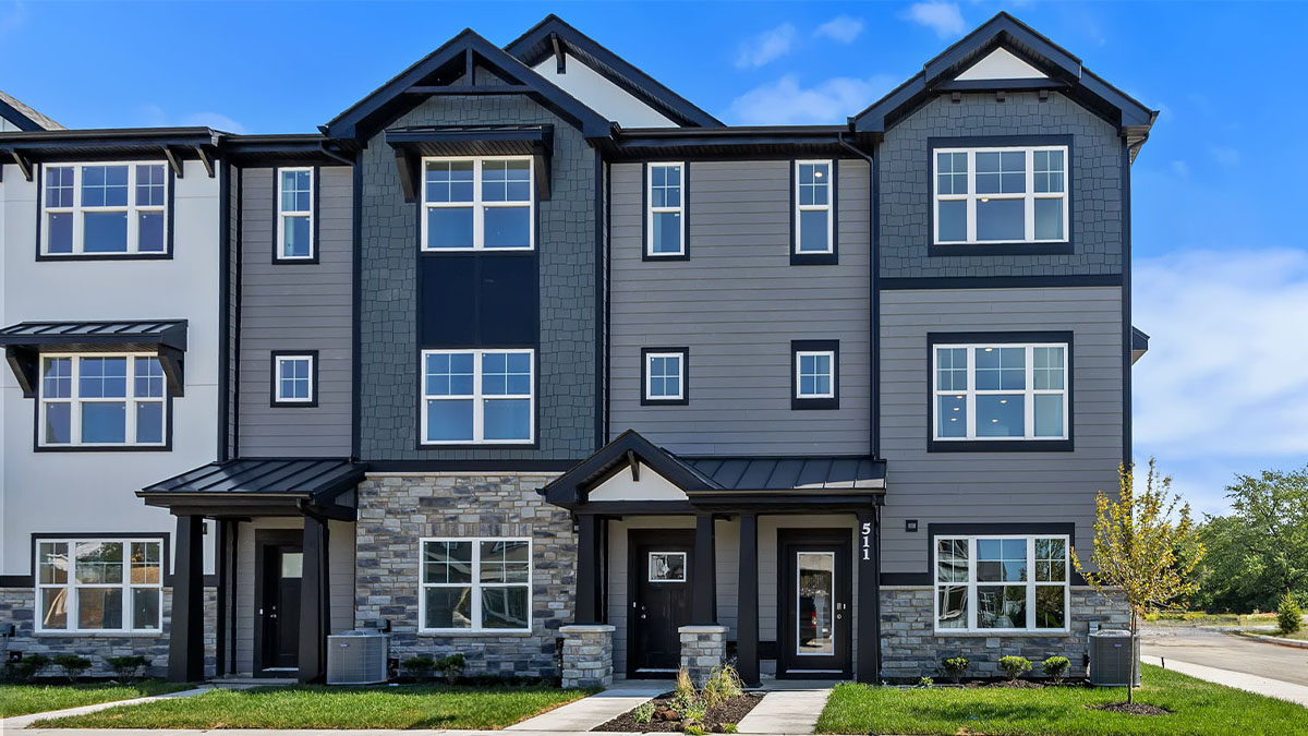 Exterior of three-story townhomes.