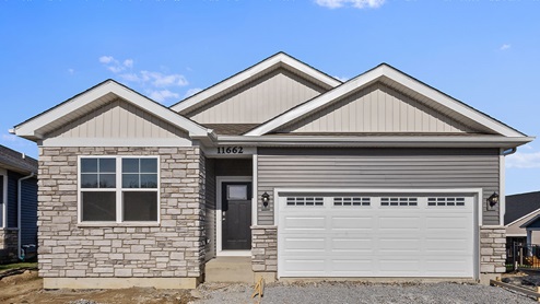Single family ranch home with stone