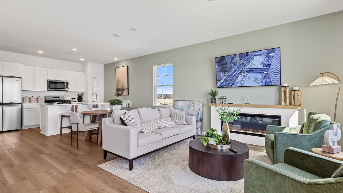 Open concept first level floor with hard wood floors.