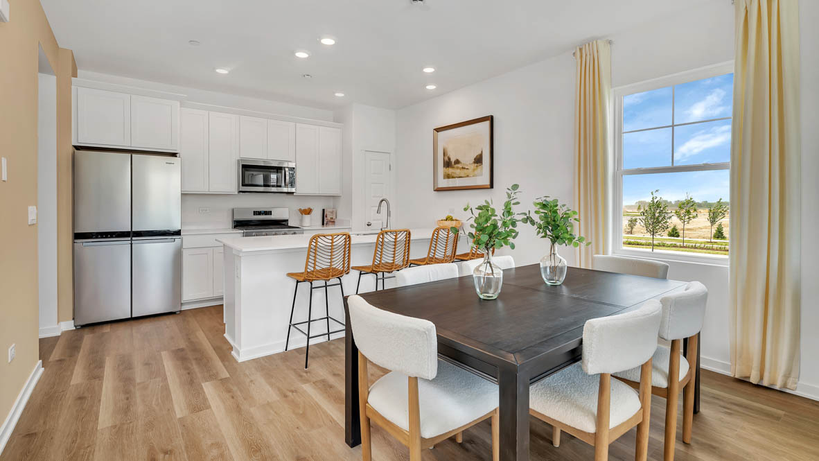 Kitchen with white cabinets and stainless steel appliances