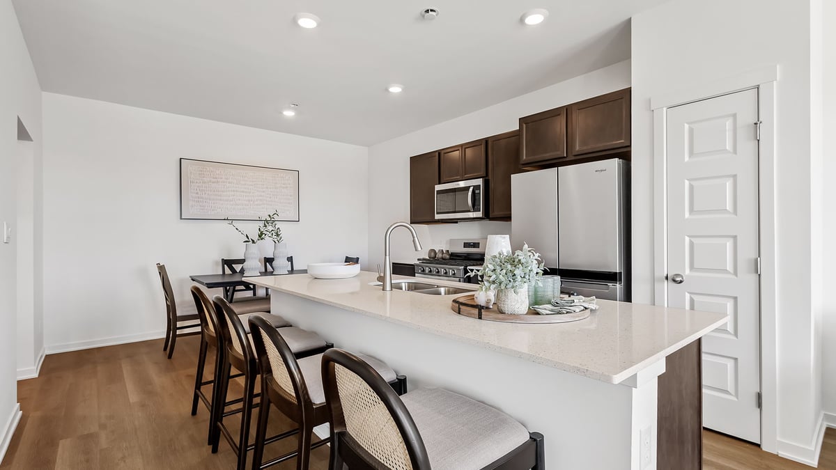 Kitchen with plenty of quartz countertop space.