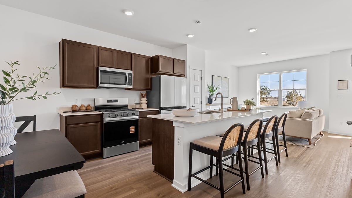 Kitchen with hard wood floors and flagstone cabinetry.