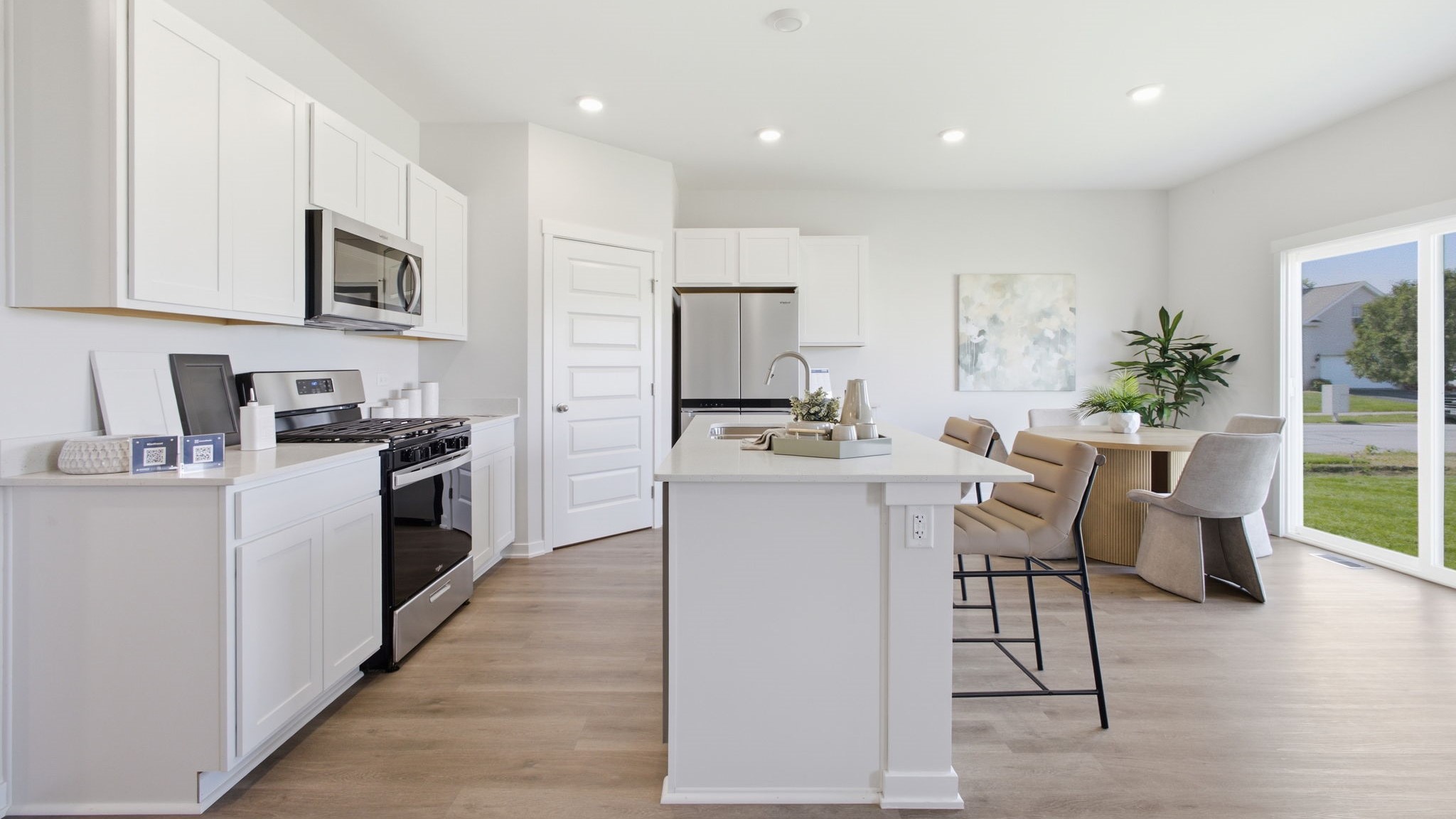 Kitchen and dining area with sliding patio doors.