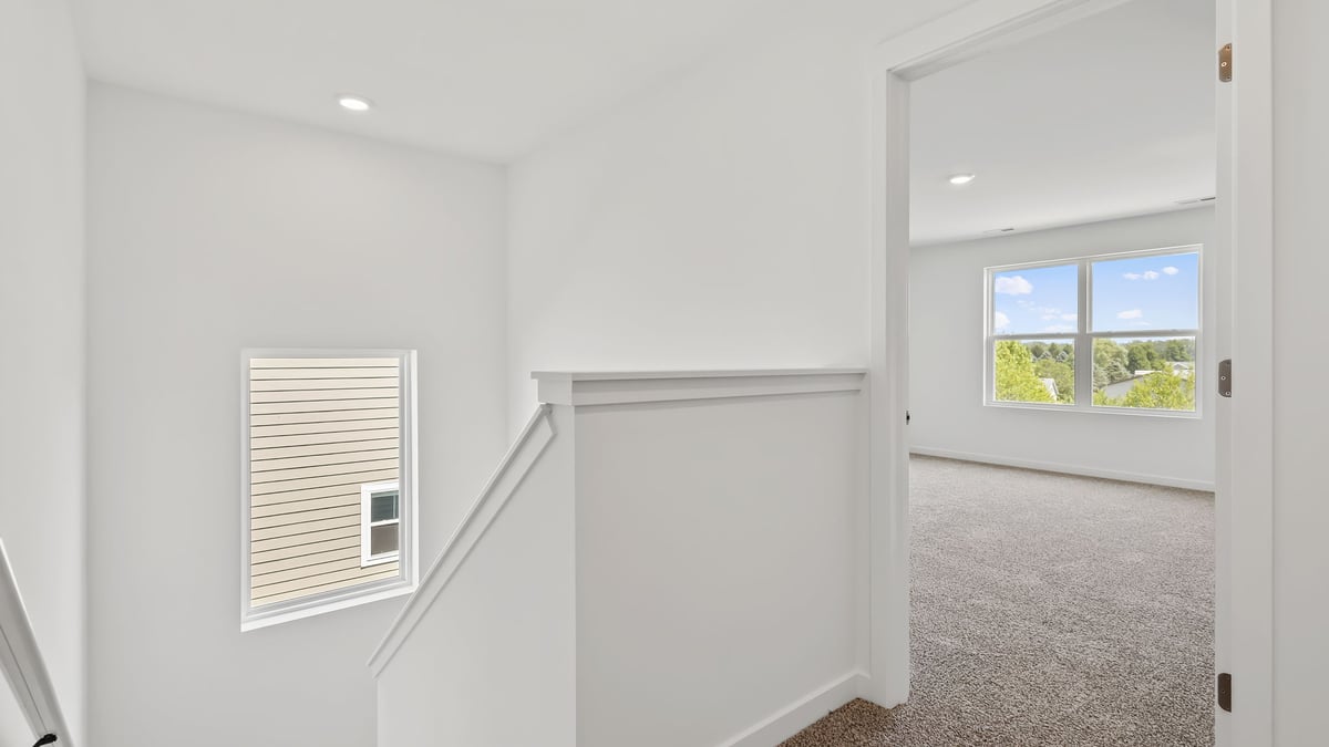 Upstairs area with carpet.