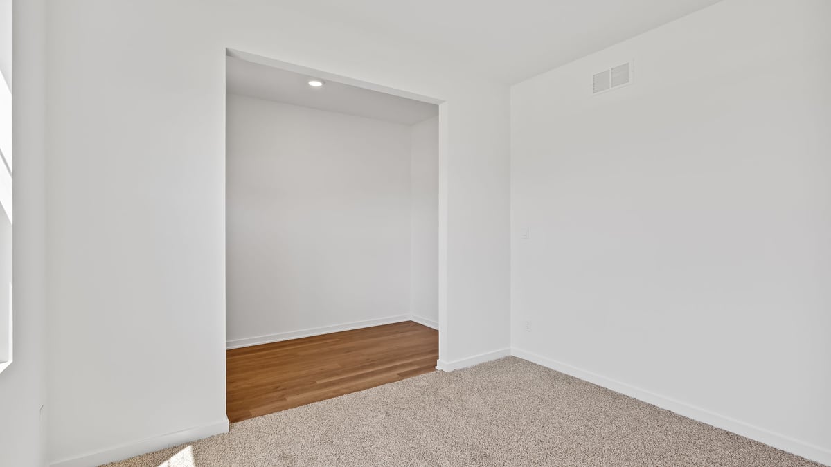 Front room with carpet and space.