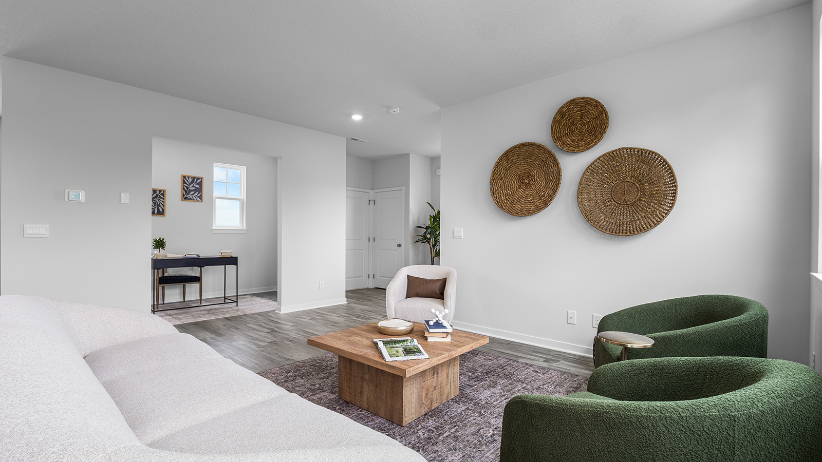 Living room with electric fireplace. New Homes in Kansas City, Missouri