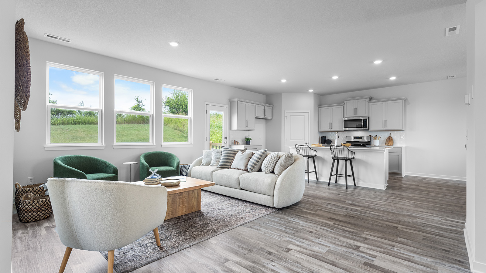 Living room with electric fireplace. New Homes in Kansas City, Missouri