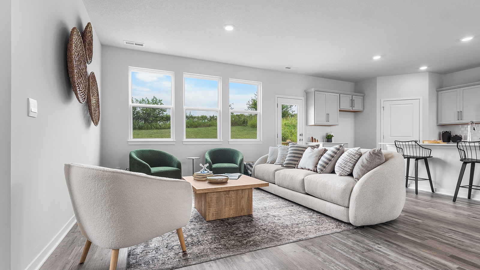 Living room with electric fireplace. New Homes in Kansas City, Missouri