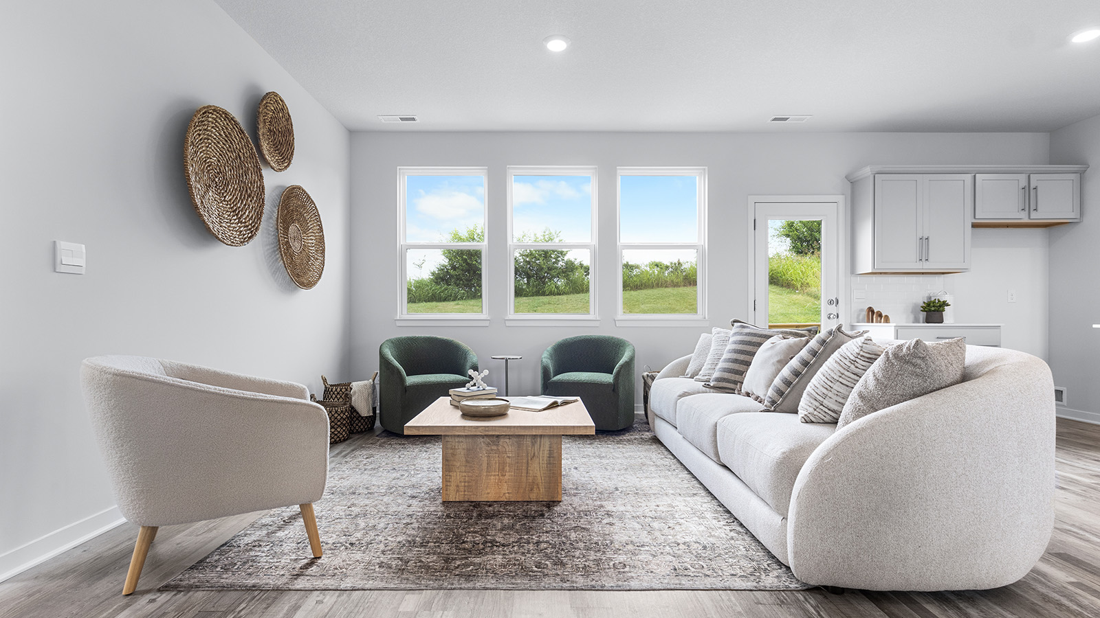 Living room with electric fireplace. New Homes in Kansas City, Missouri