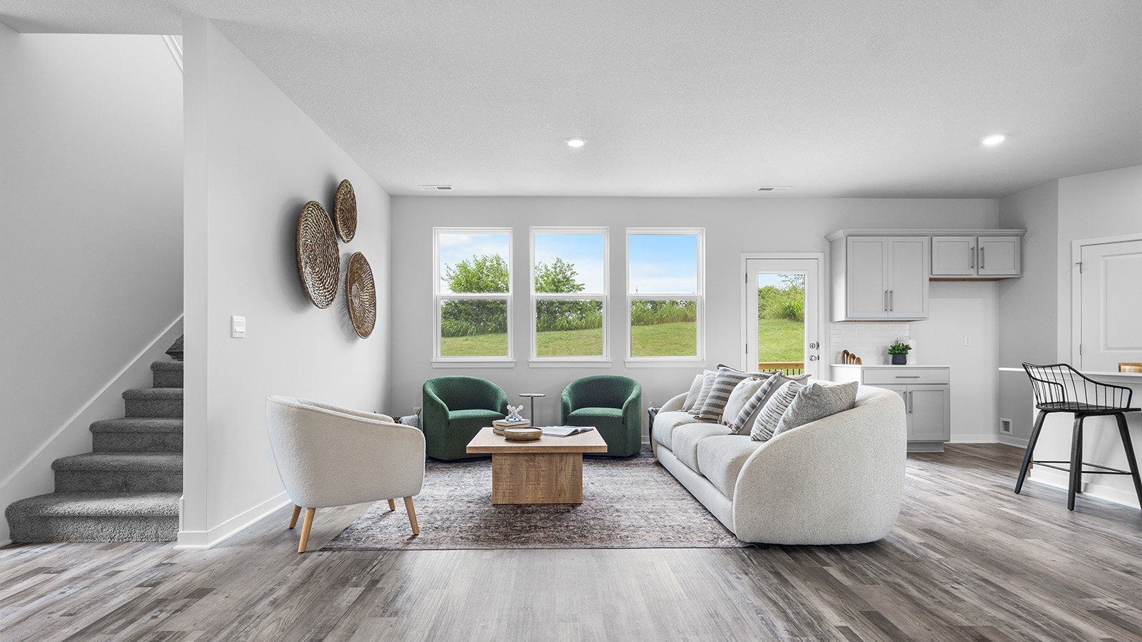 Living room with electric fireplace. New Homes in Kansas City, Missouri