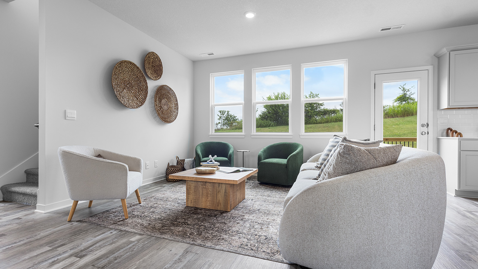 Living room with electric fireplace. New Homes in Kansas City, Missouri