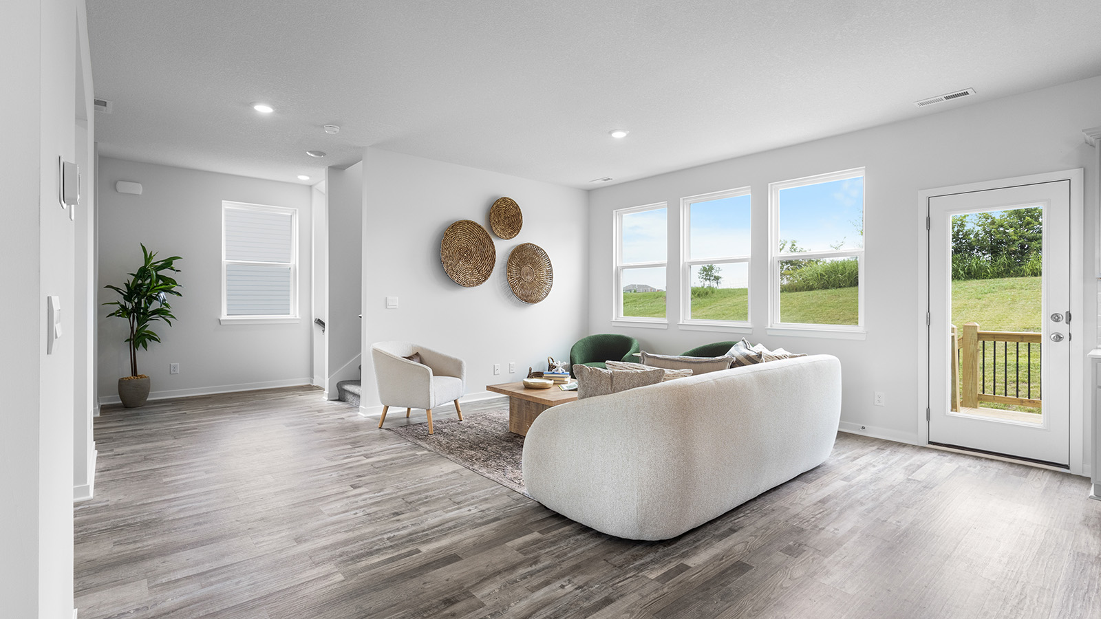 Living room with electric fireplace. New Homes in Kansas City, Missouri