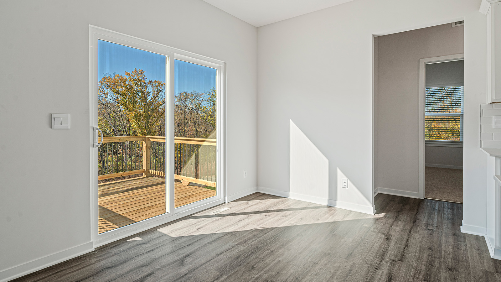 Breakfast area off of kitchen with large glass sliding door