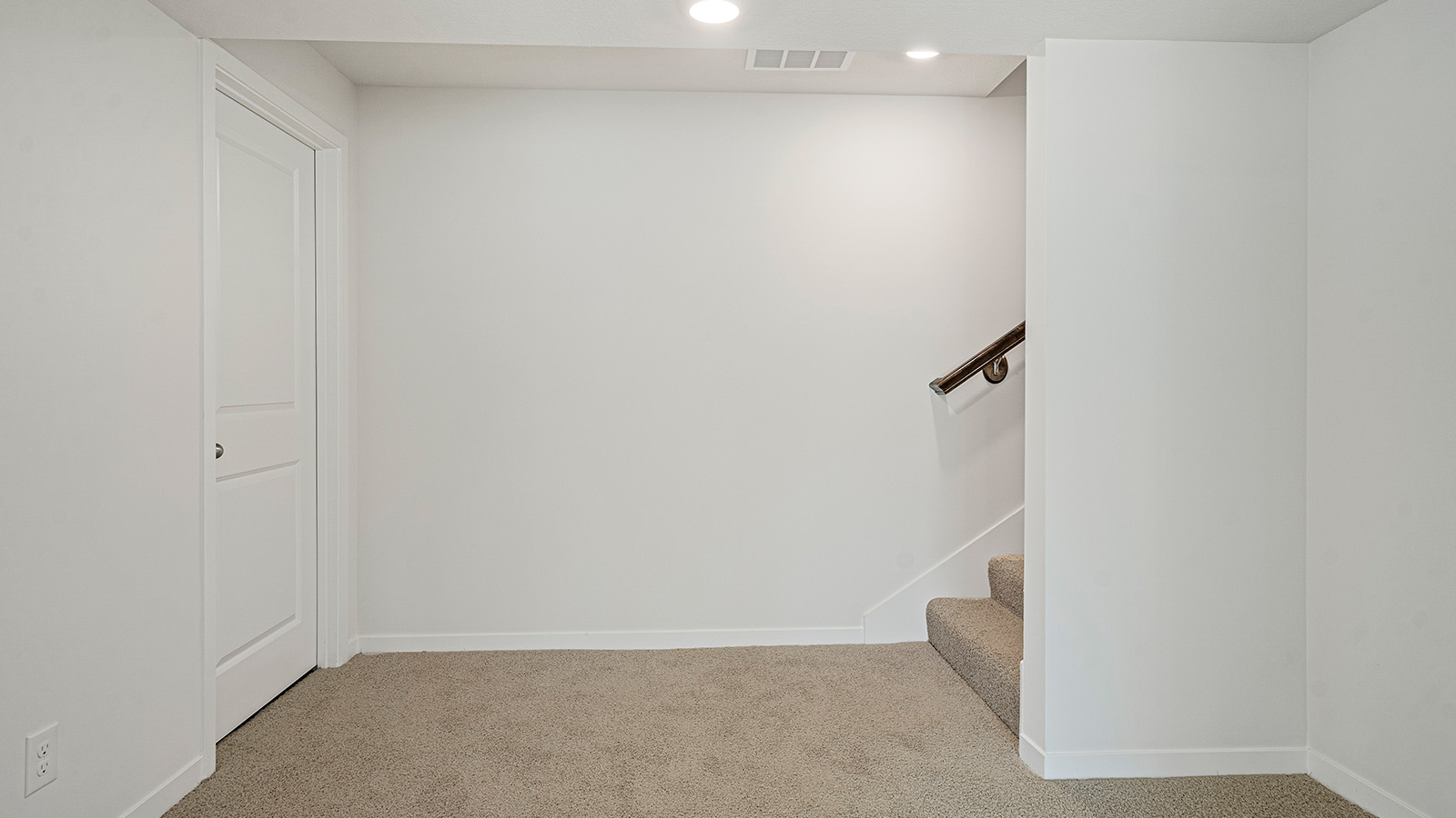 Downstairs to carpeted completed basesment