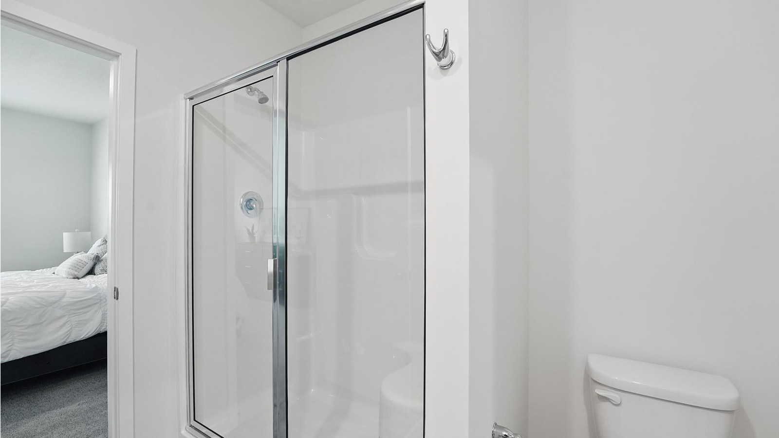 primary bathroom with glass door shower