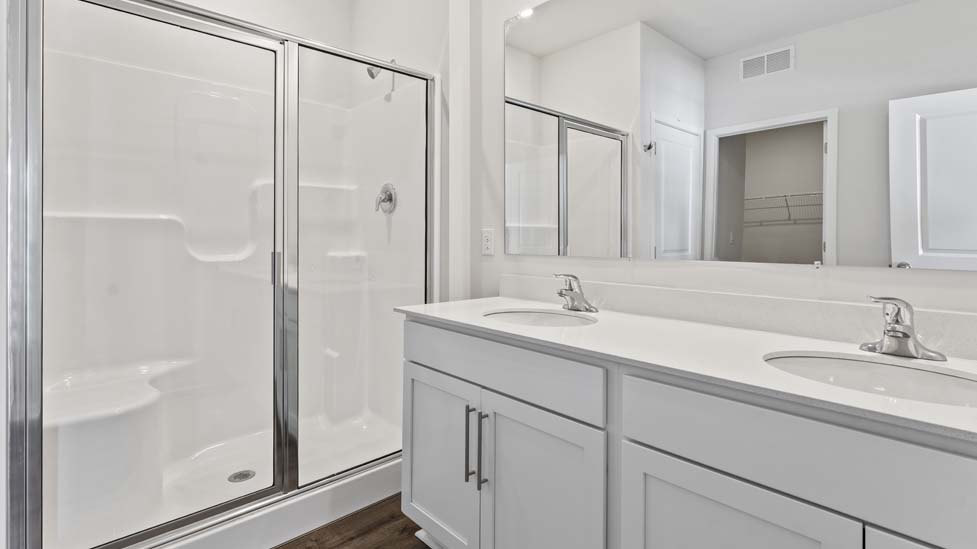 primary bathroom with glass door shower