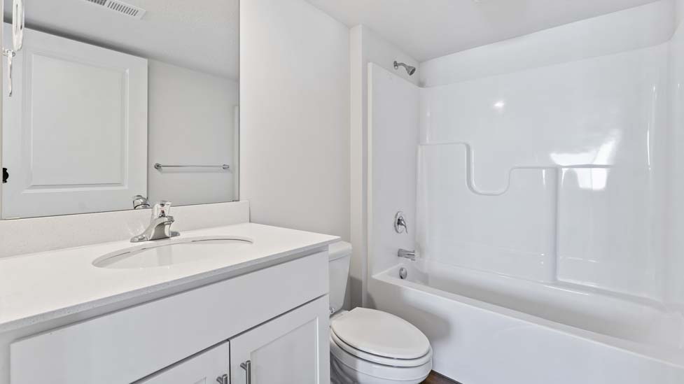 primary bathroom with glass door shower