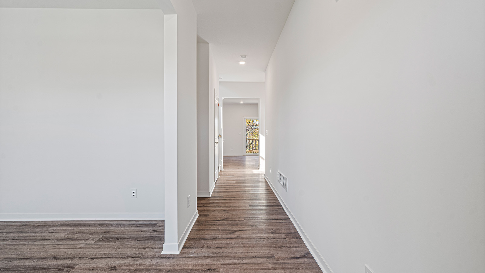 Welcoming foyer with hallway and flex room