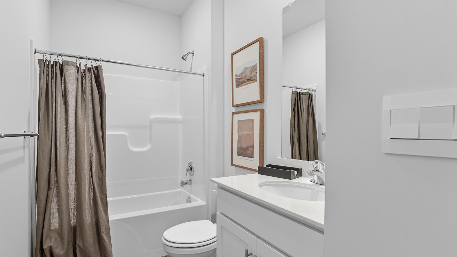 Secondary bathroom with bathtub and shower combination