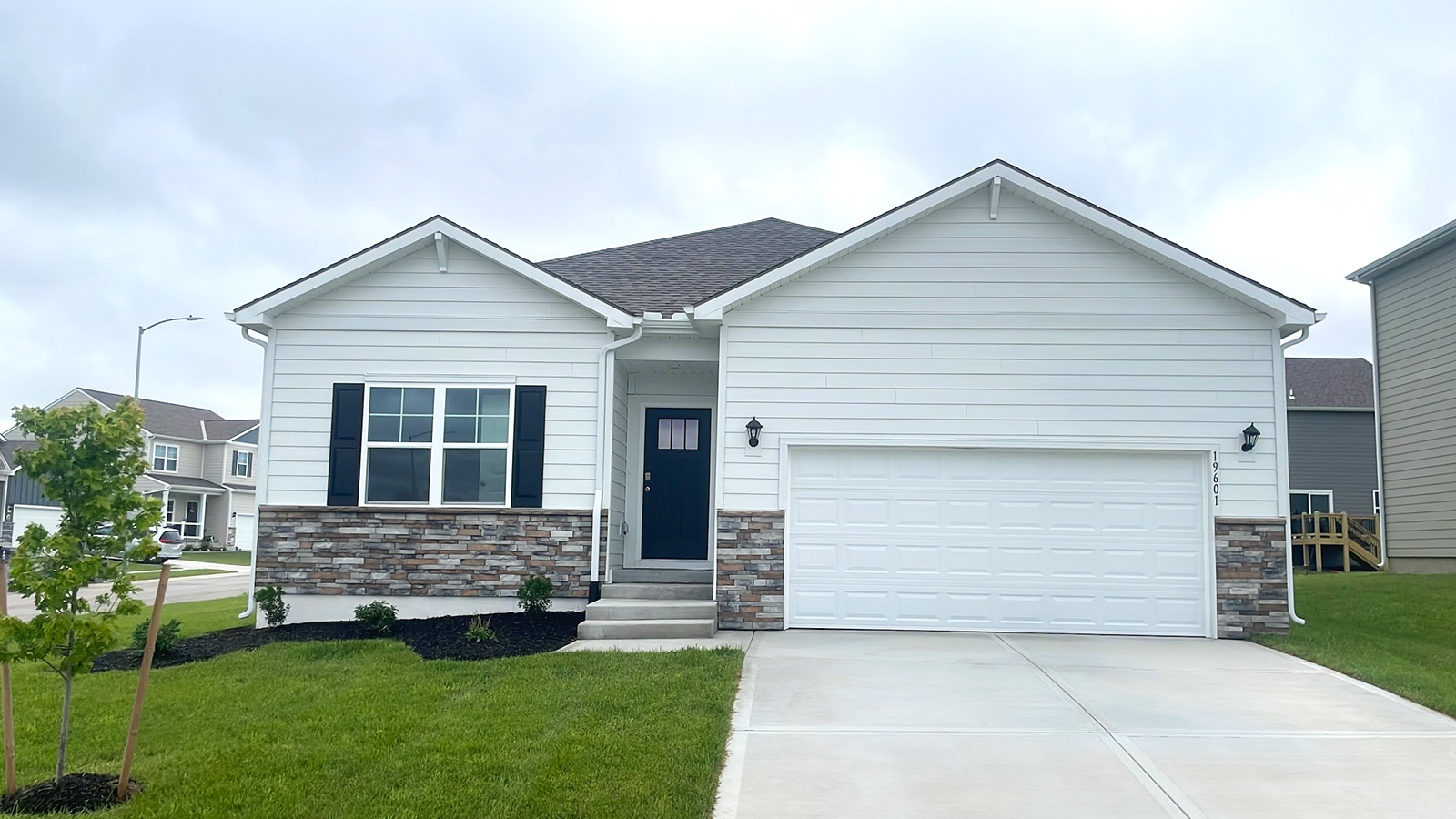 Chatham front exterior with siding and two car garage