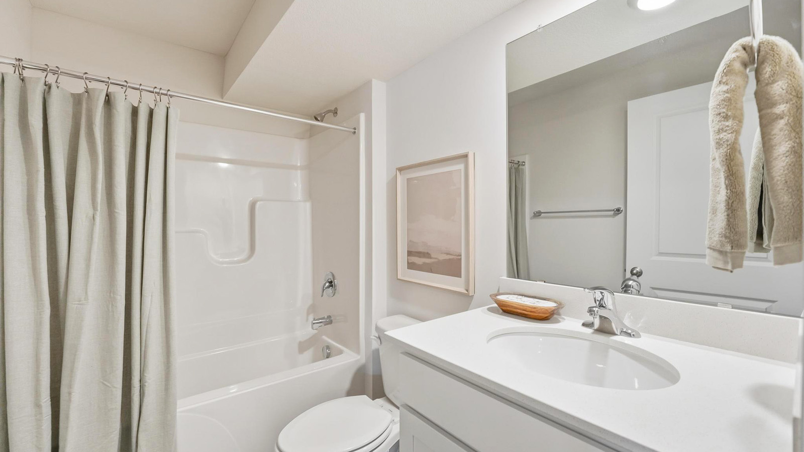 Bathroom with a bathtub shower combination