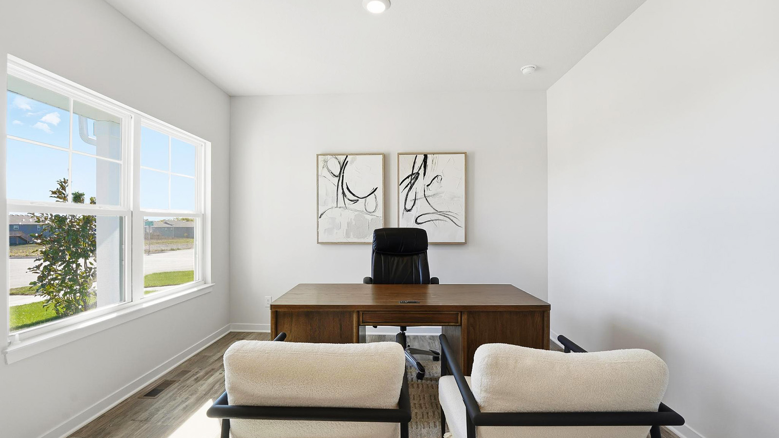 Flex or office space with large windows and French doors.