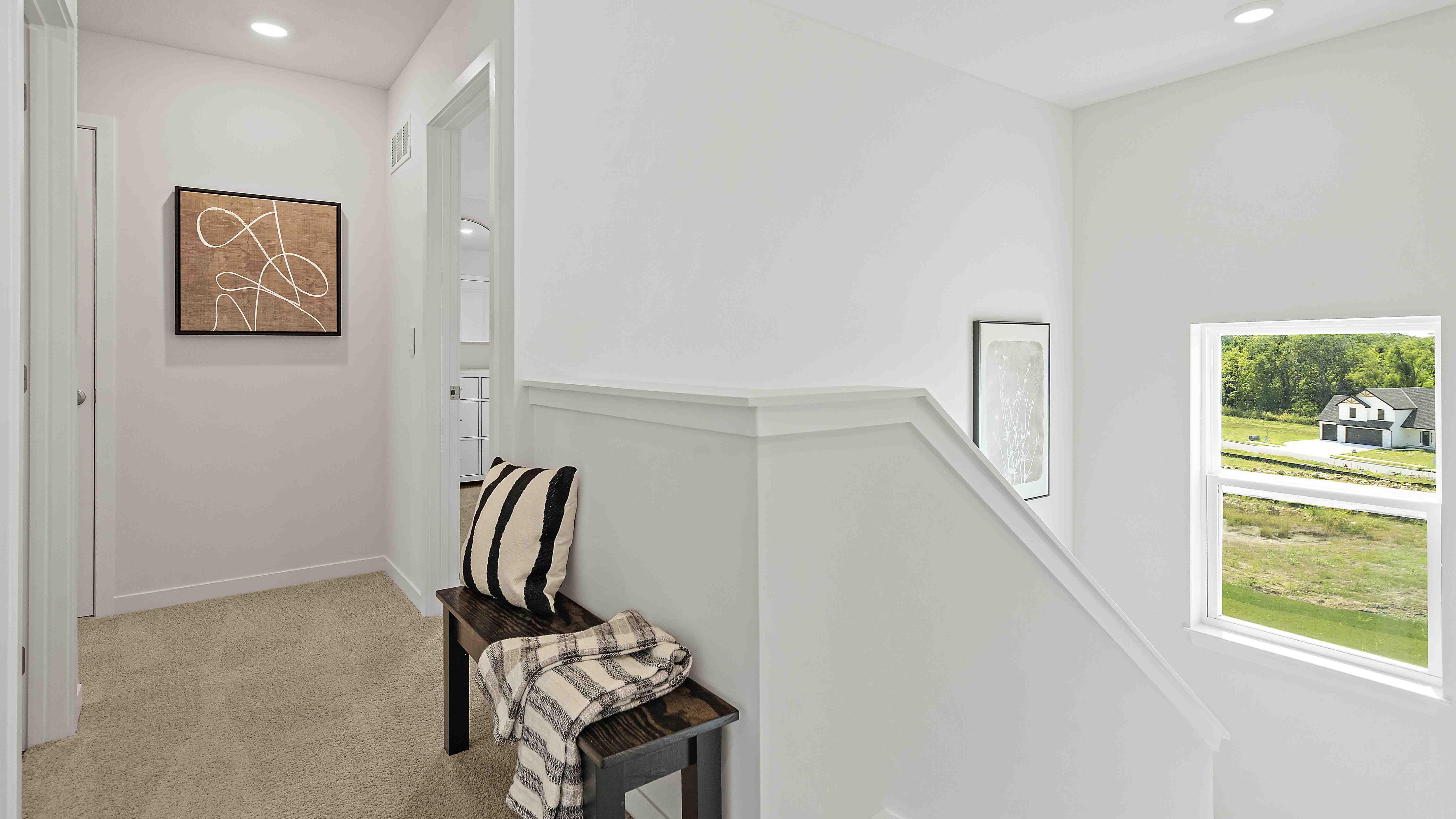 Carpeted Upstairs hallway.