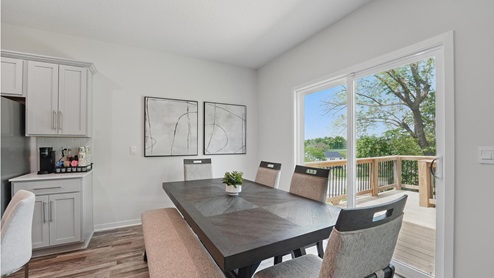 Dining area beside kitchen and living room. New Homes in Kansas City, Missouri