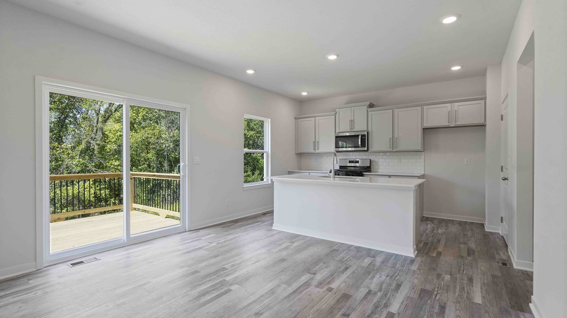 Dining area beside kitchen and living room. New Homes in Kansas City, Missouri