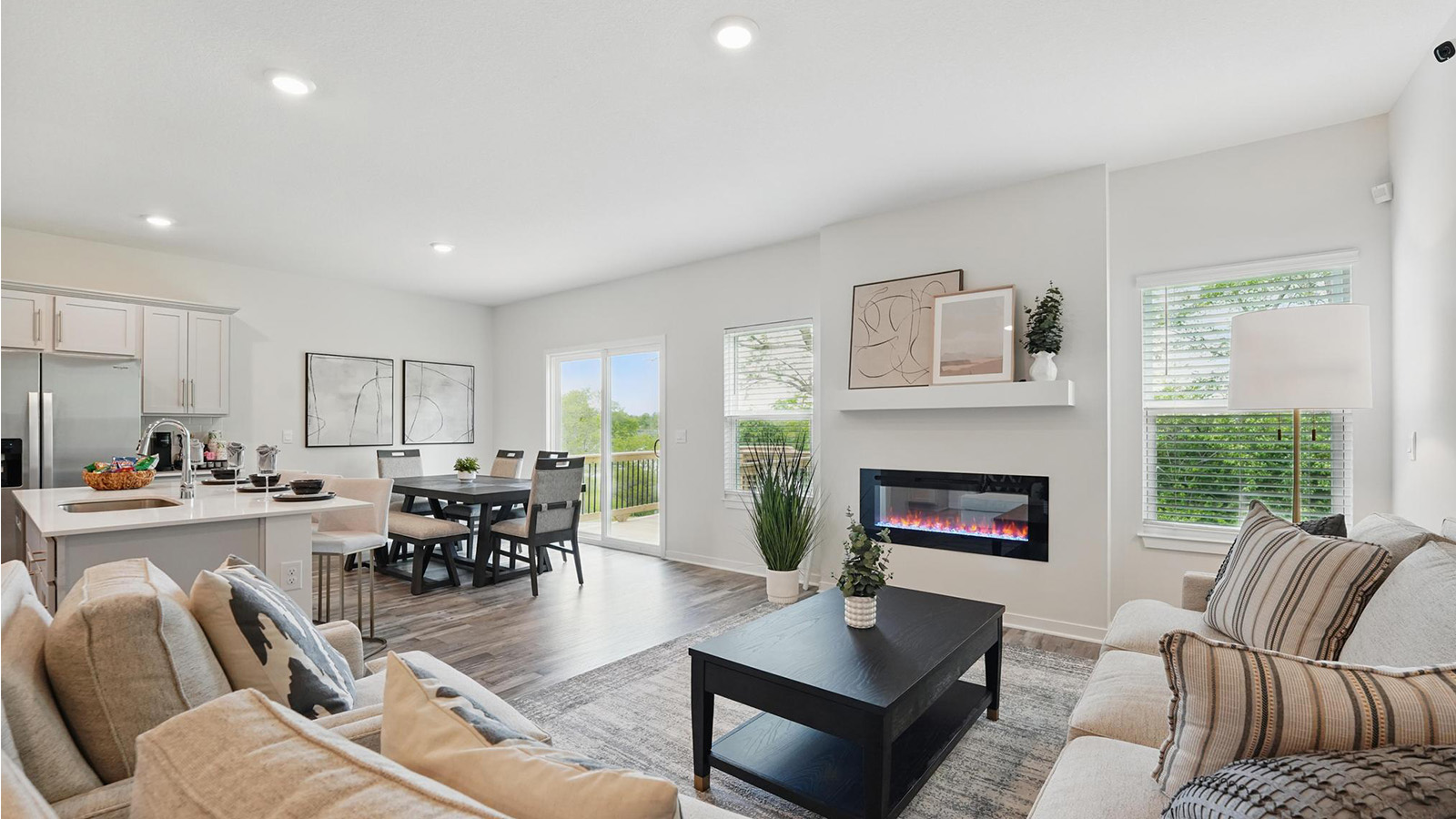 Living room with electric fireplace. New Homes in Kansas City, Missouri