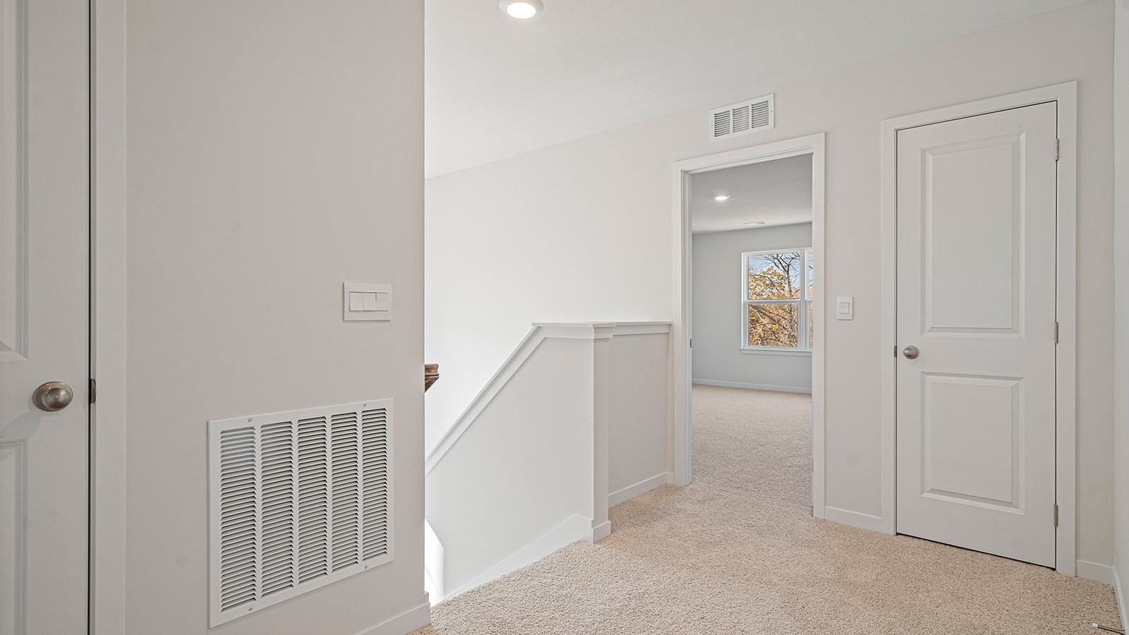 Upstairs carpeted hallway