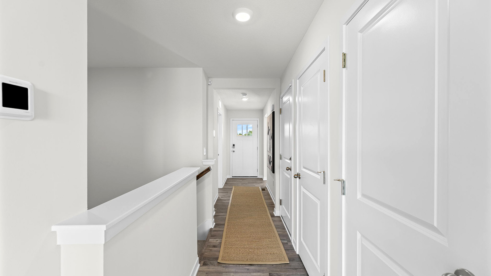 Welcoming foyer with view of home interior