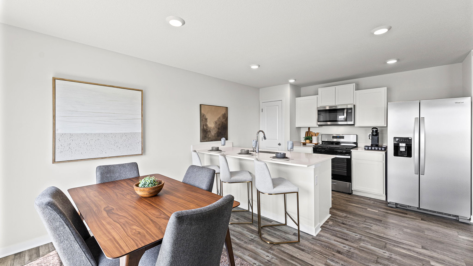 Dining area beside kitchen with sliding glass back door