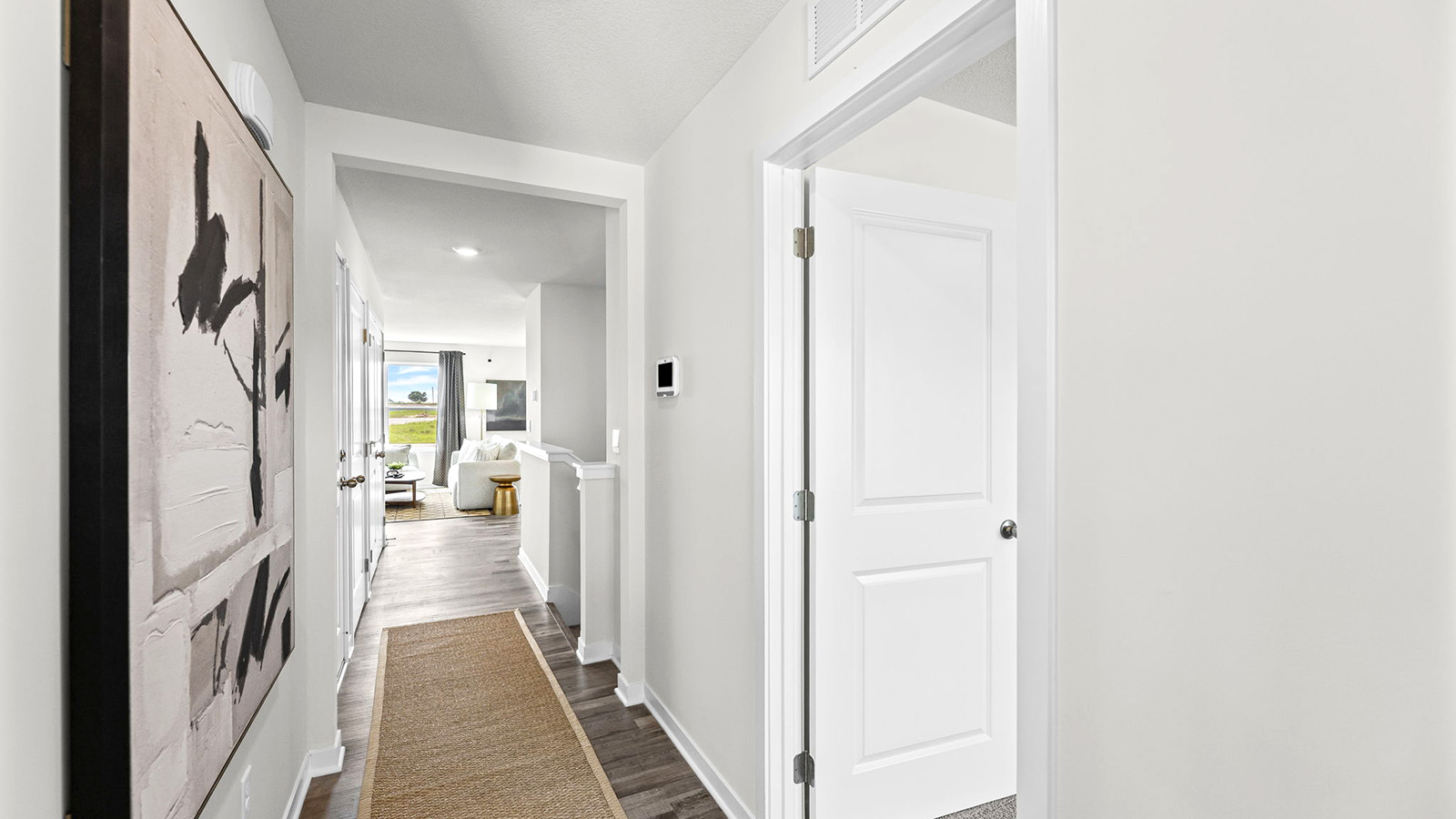 Welcoming foyer with view of home interior