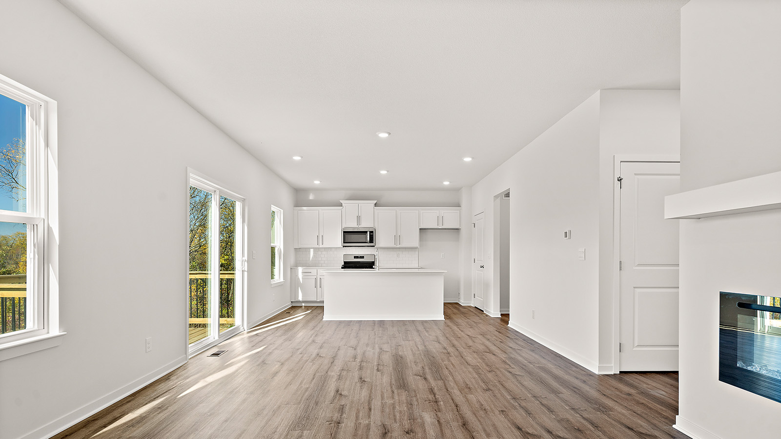 Living room with electric fireplace. New Homes in Kansas City, Missouri