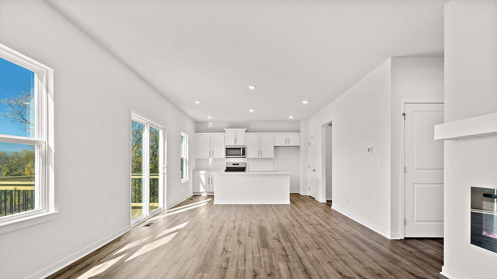Living room with electric fireplace. New Homes in Kansas City, Missouri