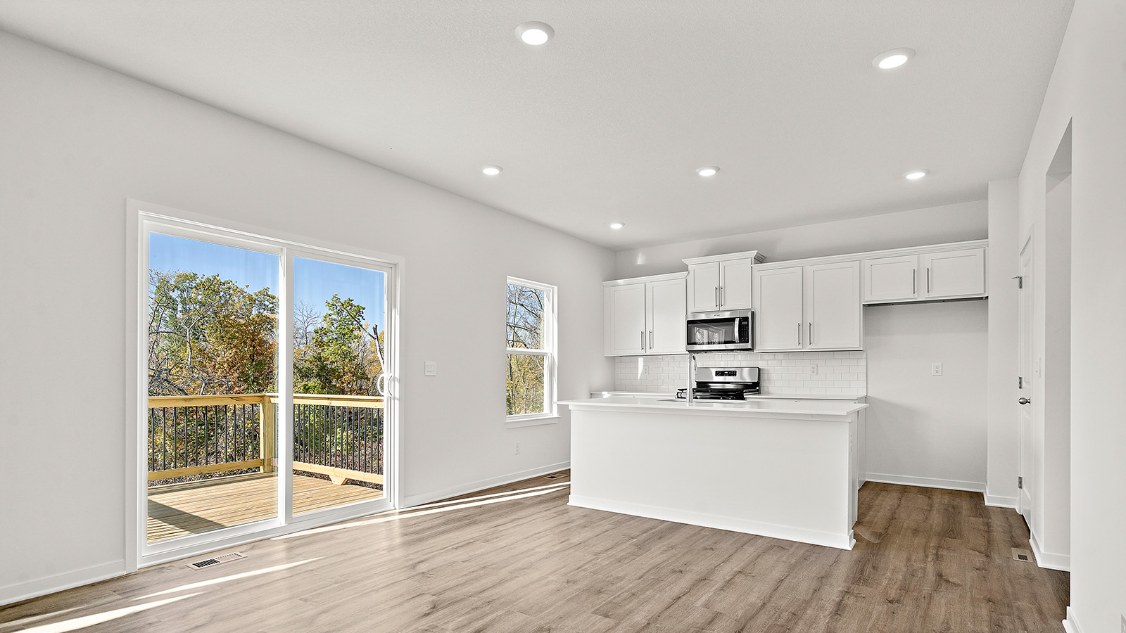 Dining area beside kitchen and living room. New Homes in Kansas City, Missouri