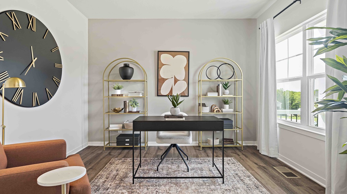 Flex office space with large window and vinyl floors