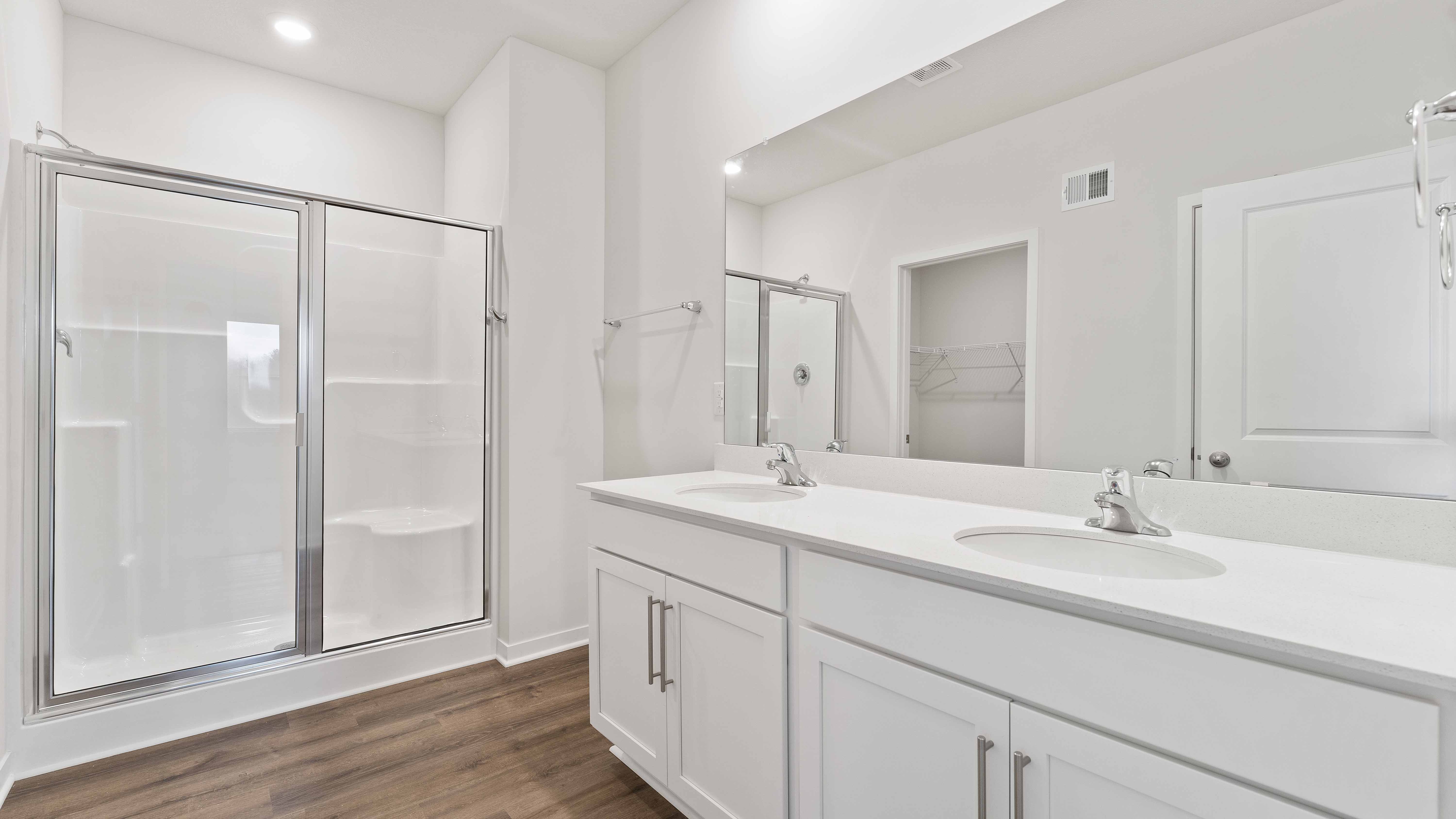 Primary bathroom with glass door shower