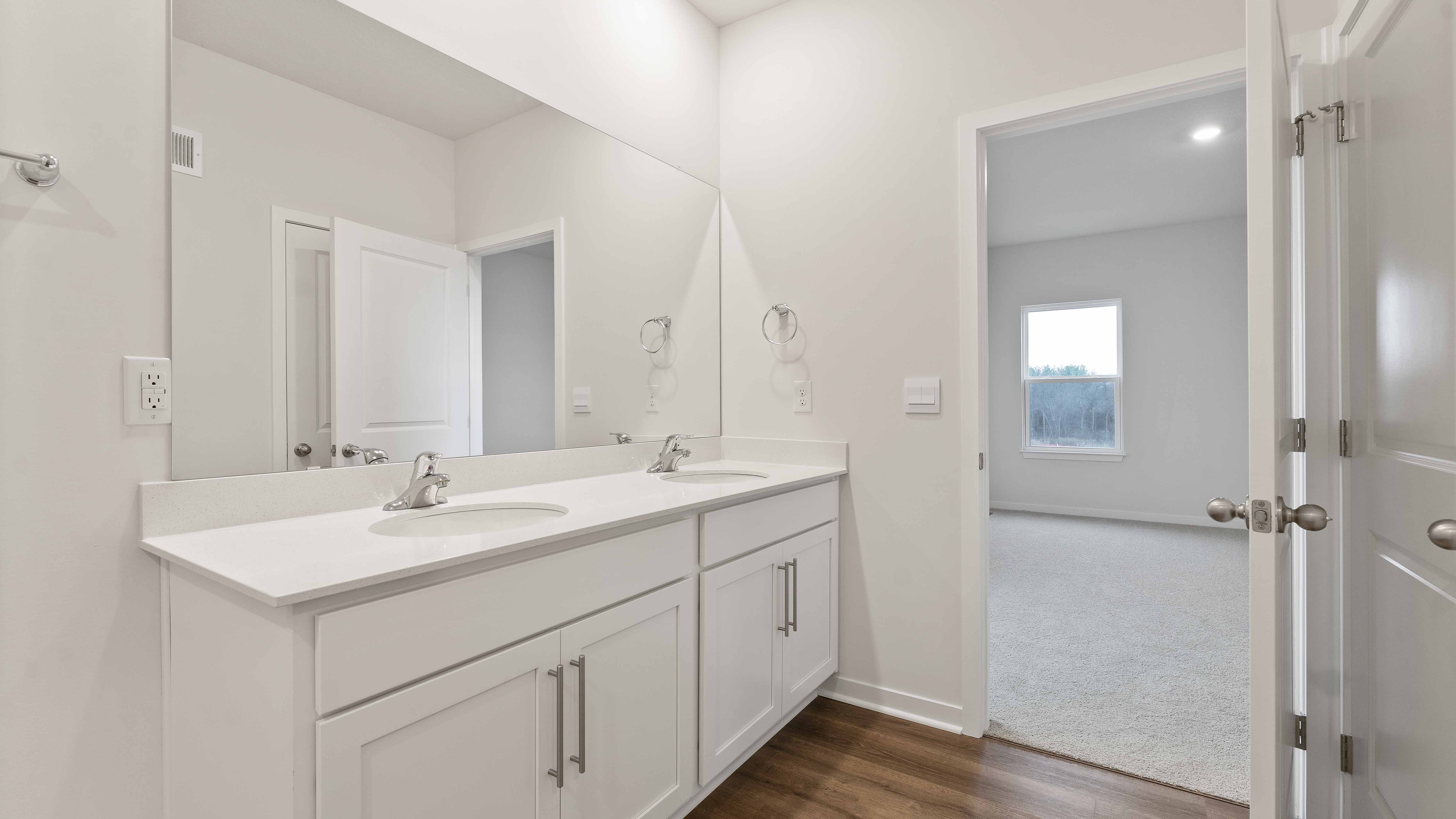 Primary bathroom with glass door shower