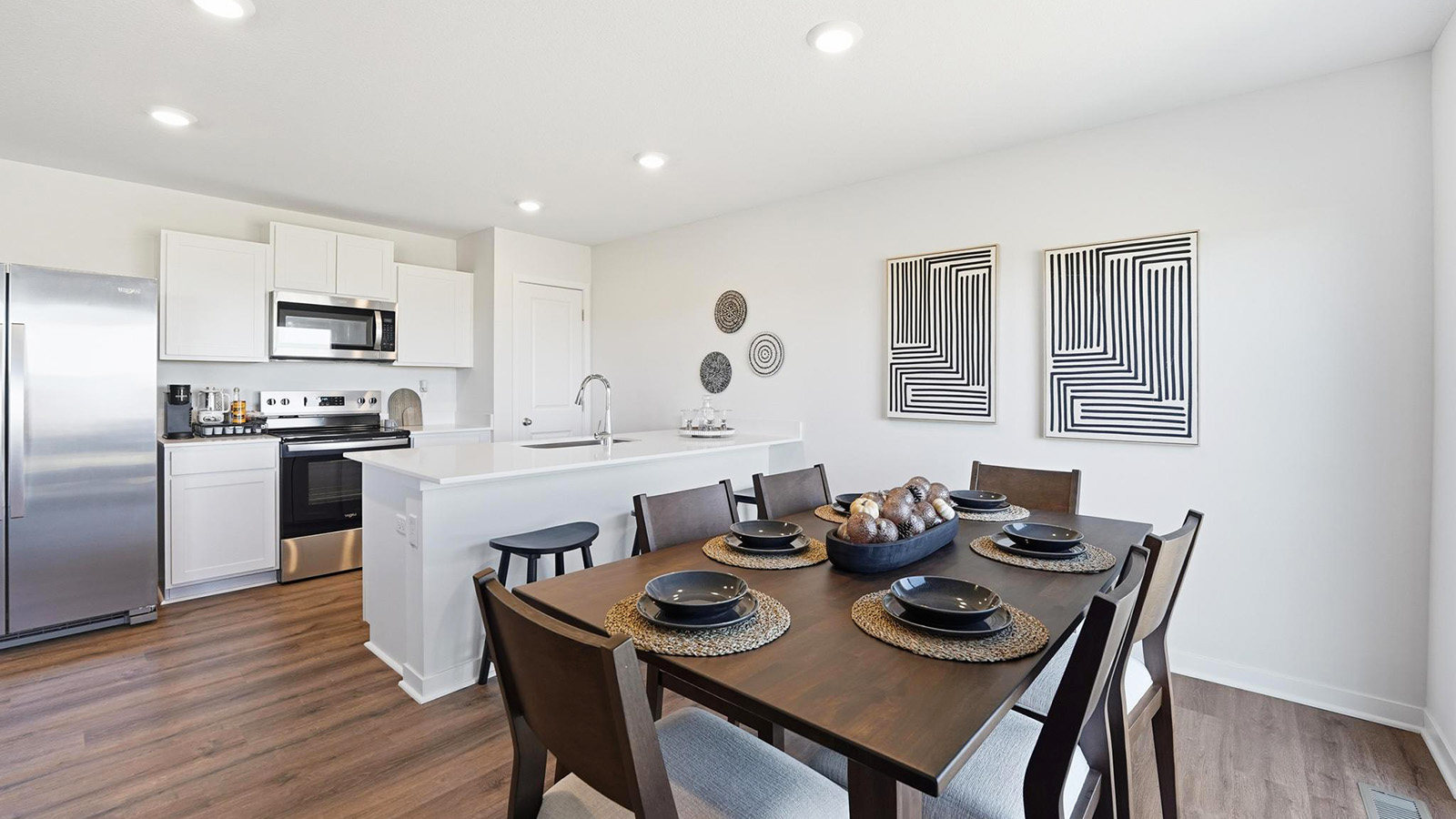 Dining area beside kitchen with sliding glass back door